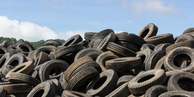 Truck and bus tires for heavy-duty tire shredder processing